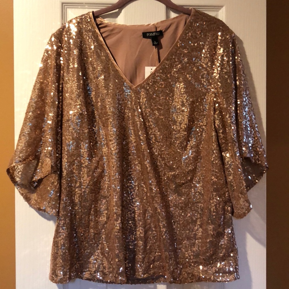 Great holiday top! New with tags !!